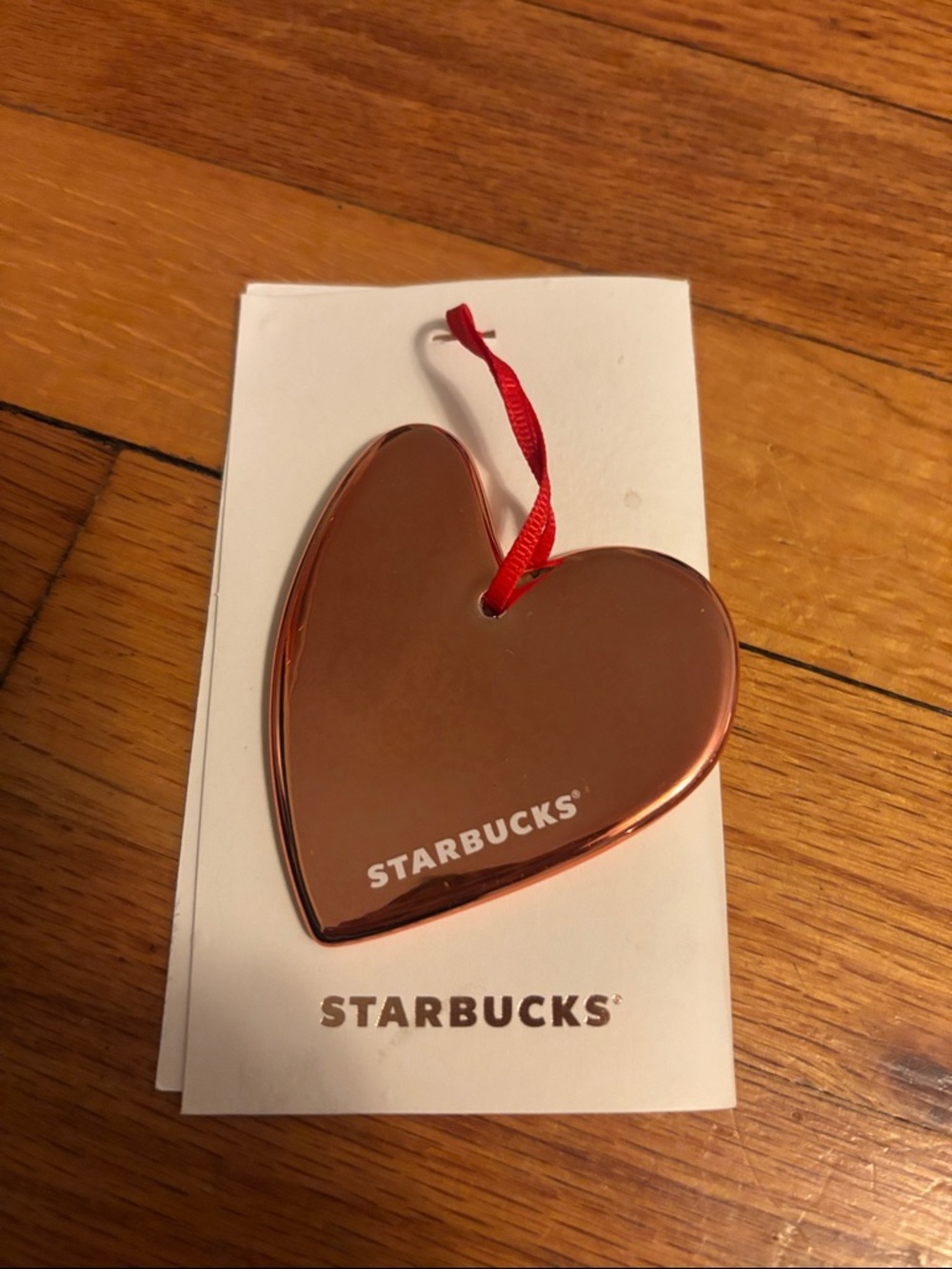 Starbucks Metallic Rose Gold Heart Ornament with Red Ribbon